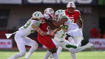 Johnny Ragin III (#28) makes a tackle at Utah, 2016