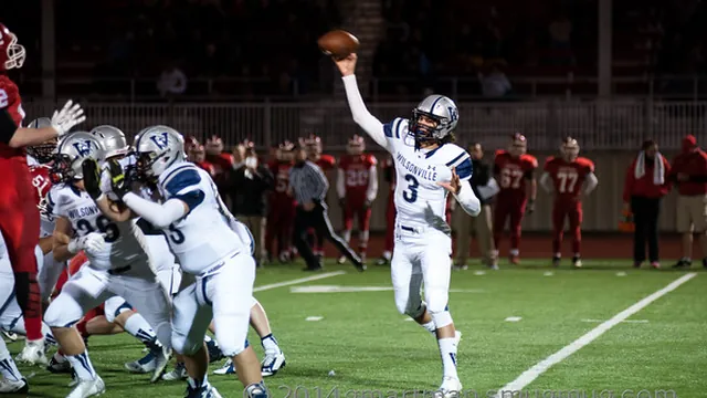 Wilsonville quarterback Connor Neville throws a pass